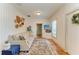 Comfortable living room featuring wood floors, natural light, stylish decor, and neutral tones at 2509 8Th W Ave, Bradenton, FL 34205