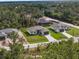 An aerial shot shows the new construction homes in a wooded community at 2638 Hagerick Ln, North Port, FL 34288