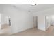 Open living room with tile flooring and neutral color palette at 2638 Hagerick Ln, North Port, FL 34288