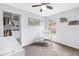 Bedroom featuring neutral colored walls, a rocking chair, closet space and decor at 3162 27Th E Ct, Palmetto, FL 34221
