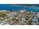 Aerial view of Anna Maria Island, showing waterfront properties and scenic bridge at 3808 Cape Vista Dr, Bradenton, FL 34209