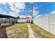 Fenced back yard featuring a pool and picnic table at 3808 Cape Vista Dr, Bradenton, FL 34209