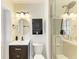 Bathroom featuring updated fixtures, vanity and tiled walk-in shower at 3808 Cape Vista Dr, Bradenton, FL 34209