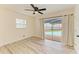 Bedroom featuring a ceiling fan and sliding glass doors leading to a pool at 3808 Cape Vista Dr, Bradenton, FL 34209