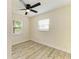Bright bedroom with two windows providing plenty of natural light at 3808 Cape Vista Dr, Bradenton, FL 34209