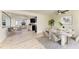 Open-concept dining area with a modern table set, seamlessly connected to the kitchen and living room at 3808 Cape Vista Dr, Bradenton, FL 34209