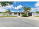 Charming single story home features well maintained landscaping, fresh white paint and modern black accents at 3808 Cape Vista Dr, Bradenton, FL 34209