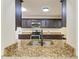Kitchen featuring granite counters, stainless steel appliances, and undermount sink at 3808 Cape Vista Dr, Bradenton, FL 34209