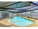 Relaxing pool surrounded by covered lanai, perfect for enjoying sunny days at 3808 Cape Vista Dr, Bradenton, FL 34209