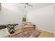 Cozy room with wood flooring, and comfy chair, perfect for relaxation or study at 3988 Berlin Dr, Sarasota, FL 34233