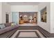 Open living space seamlessly connects to the outdoors with sliding doors and stylish decor at 3988 Berlin Dr, Sarasota, FL 34233