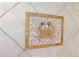 Close-up of a decorative tile mosaic featuring a crab design, adding a coastal touch at 3988 Berlin Dr, Sarasota, FL 34233