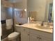 Bathroom features a shower, single sink, and neutral walls at 4027 Allure Ln, North Port, FL 34287