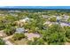 Overhead view of a home surrounded by mature trees, canal access and picturesque neighborhood at 4322 Concert St, Port Charlotte, FL 33948