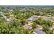 This home in a verdant neighborhood is framed by lush trees, featuring a convenient community at 4322 Concert St, Port Charlotte, FL 33948