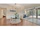 Dining room with seating for four and sliding glass doors to lanai at 4322 Concert St, Port Charlotte, FL 33948