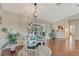 Bright dining room with hardwood floors and adjacent view of the lanai at 4322 Concert St, Port Charlotte, FL 33948