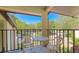 Relaxing balcony space with outdoor seating and a view of the surrounding community and street at 4325 46Th W Ave # 203, Bradenton, FL 34210