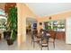 Cozy dining area with a round table, four chairs, and warm, inviting decor at 4325 46Th W Ave # 203, Bradenton, FL 34210