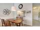 Charming dining area with a view to the kitchen at 4325 46Th W Ave # 203, Bradenton, FL 34210