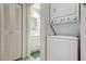 Convenient in-unit laundry closet with stacked washer and dryer units at 4325 46Th W Ave # 203, Bradenton, FL 34210