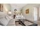 Cozy living room showcasing stylish furniture and decor with dining area view at 4325 46Th W Ave # 203, Bradenton, FL 34210