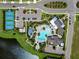 Aerial view of community pool with tennis courts, lush landscaping, and ample parking at 4407 Big Woods Way, Parrish, FL 34219