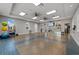 Bright yoga room featuring wall mirrors, a barre, and exercise equipment, ideal for fitness and wellness activities at 4407 Big Woods Way, Parrish, FL 34219