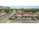Aerial view of the condo community showing parking and landscaping at 4475 Sandner Dr, Sarasota, FL 34243