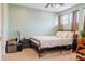 Bedroom featuring light green walls and a window for natural light at 4475 Sandner Dr, Sarasota, FL 34243