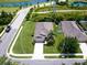 Aerial view of property with lush landscaping and proximity to water features at 4615 73Rd E St, Bradenton, FL 34203