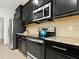 Well-equipped kitchen featuring stainless steel appliances and granite countertops at 4615 73Rd E St, Bradenton, FL 34203