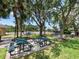 The picnic area offers multiple tables in a shady spot next to the community tennis courts at 4615 73Rd E St, Bradenton, FL 34203