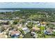 Overhead view of a quiet neighborhood with diverse homes and established trees and landscaping at 5223 Shadow Lawn Dr, Sarasota, FL 34242