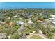 Breathtaking aerial view showcasing lush tropical foliage, waterways, and nearby coastal community at 5223 Shadow Lawn Dr, Sarasota, FL 34242