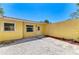 Private courtyard featuring clean, neutral colors and rock ground cover providing a tranquil outdoor space at 5223 Shadow Lawn Dr, Sarasota, FL 34242