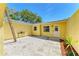 Private courtyard featuring clean, neutral colors and rock ground cover providing a tranquil outdoor space at 5223 Shadow Lawn Dr, Sarasota, FL 34242