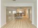 Open floor plan with a breakfast bar connecting the living area to the updated kitchen at 5223 Shadow Lawn Dr, Sarasota, FL 34242