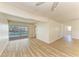 Bright living room with sliding glass doors to the outdoor lanai at 5223 Shadow Lawn Dr, Sarasota, FL 34242