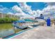 Scenic marina view with boats docked alongside rental and service signage in a waterfront setting at 5223 Shadow Lawn Dr, Sarasota, FL 34242