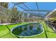 Enjoy a refreshing swim in this private pool surrounded by lush greenery at 5223 Shadow Lawn Dr, Sarasota, FL 34242