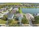 Scenic aerial view of homes on a lake, offering peaceful waterfront living in a tranquil community at 5224 58Th E Ter, Bradenton, FL 34203