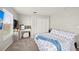 Bedroom featuring a white closet, desk, and window with a view at 5224 58Th E Ter, Bradenton, FL 34203