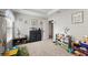 Bright bedroom featuring neutral walls, ample toy storage, and a neutral carpet at 5224 58Th E Ter, Bradenton, FL 34203