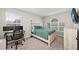 Bedroom with lots of natural light and a work space at 5224 58Th E Ter, Bradenton, FL 34203