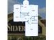 Detailed first-floor floorplan including dimensions for the dining room, kitchen, living room, bathroom, and garage at 5224 58Th E Ter, Bradenton, FL 34203