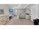 Spacious primary bedroom features a tray ceiling, ceiling fan and neutral décor at 5224 58Th E Ter, Bradenton, FL 34203