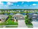 Stunning lakefront home with expansive backyard, lush landscaping, and beautiful community at 5319 120Th E Ave, Parrish, FL 34219