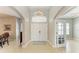 Elegant foyer featuring tile flooring, chandelier, and an open floor plan at 5319 120Th E Ave, Parrish, FL 34219