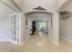 Welcoming foyer with tile flooring and arched doorways that lead to other rooms at 5319 120Th E Ave, Parrish, FL 34219